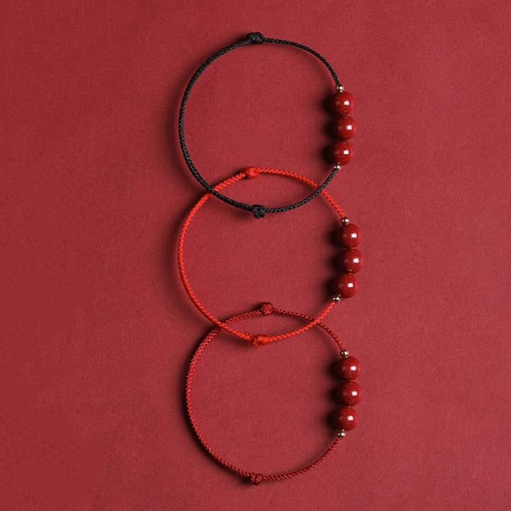 Drei rote Armbänder Zinnober – Glück & Segen Flachlage Naturstein