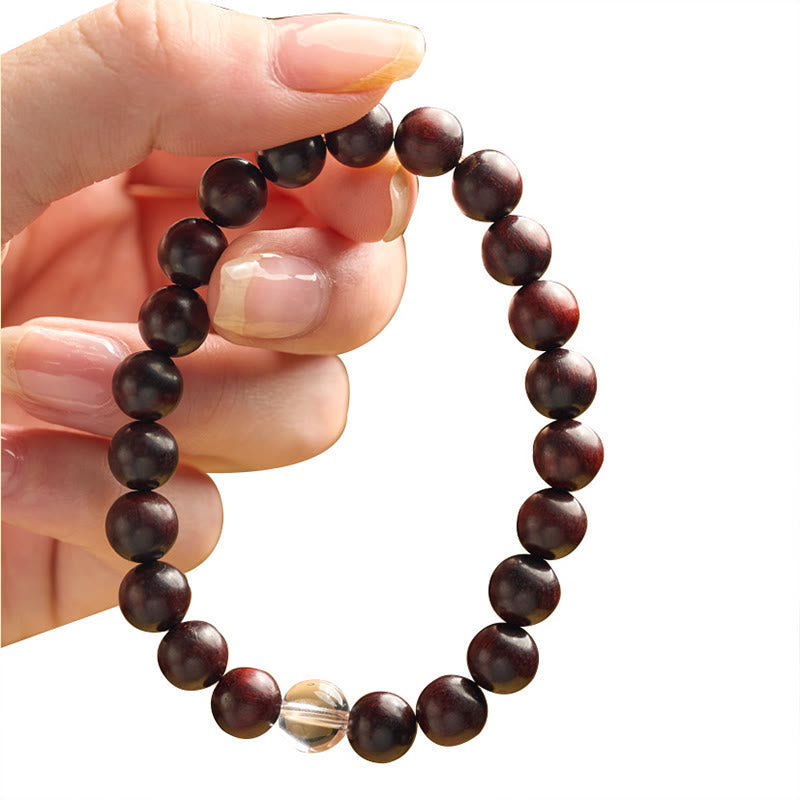 Dunkelbraunes Perlenarmband mit Kristall Sandelholz Naturstein elastisch