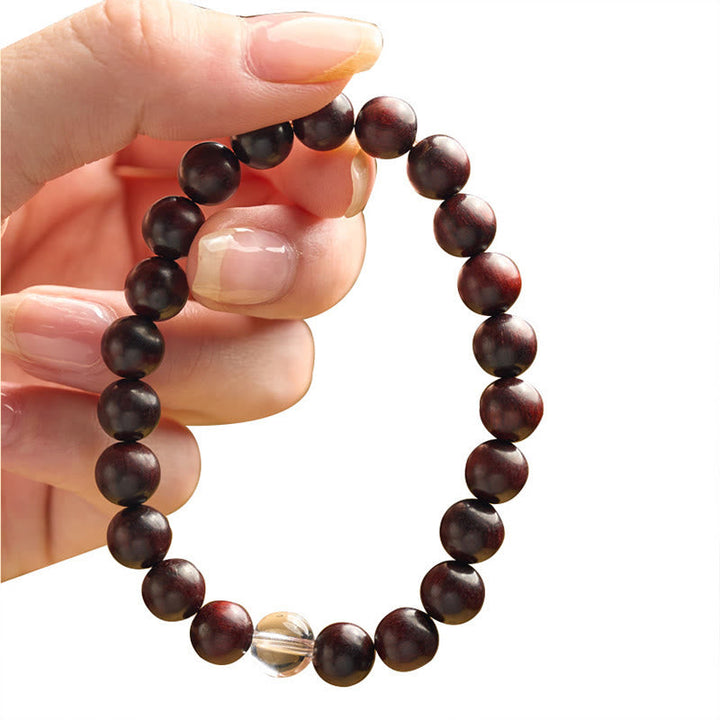 Dunkelbraunes Perlenarmband mit Kristall Sandelholz Naturstein elastisch