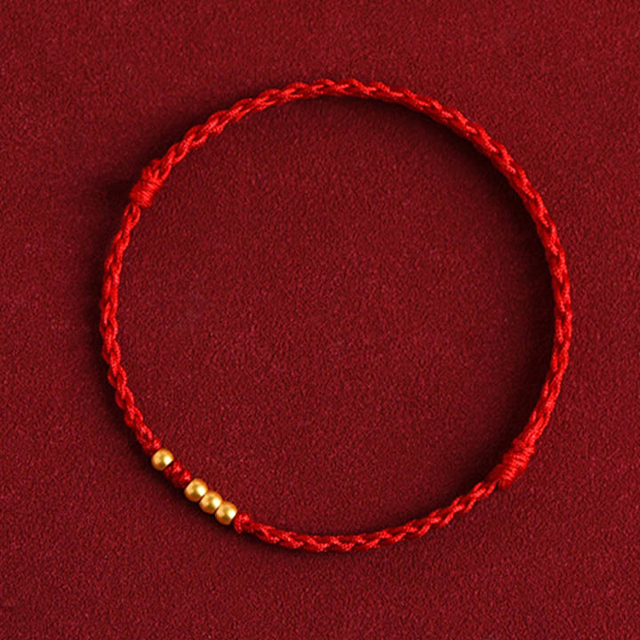 Rotes Seidenschnur Armband Paar mit goldenen Perlen Schutz Glück