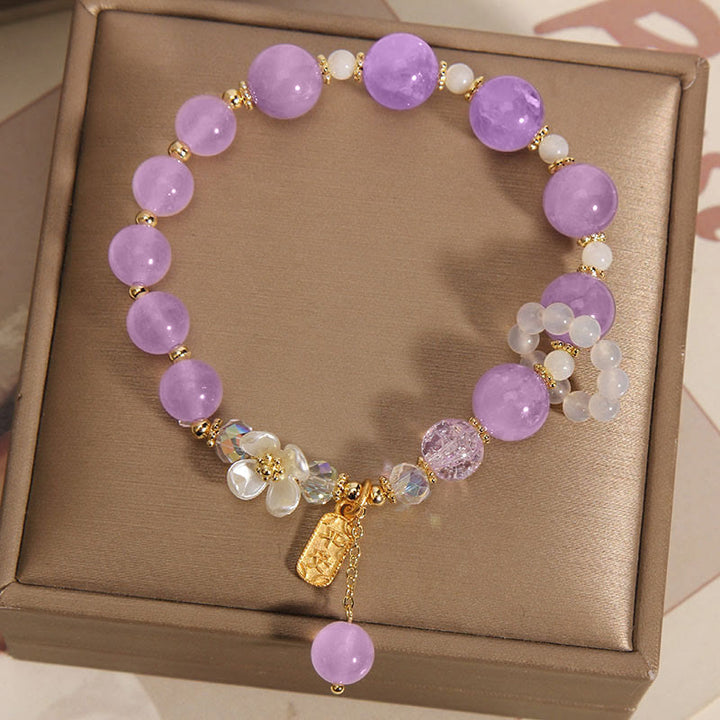 Armband Amethyst Kristall lila Perlen gold Verschluss elastisch Handgelenk.