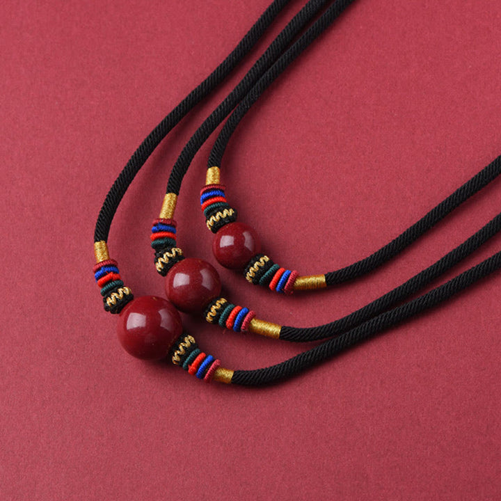 Anhänger Rot Zinnober Kette Glücksperle Schmuck