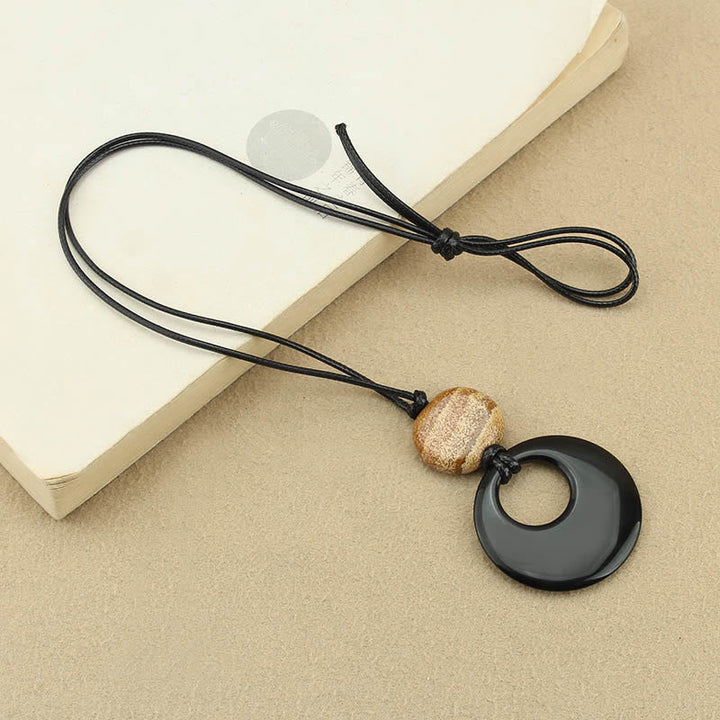 Anhänger Obsidian Liuli Kupfer Schutz