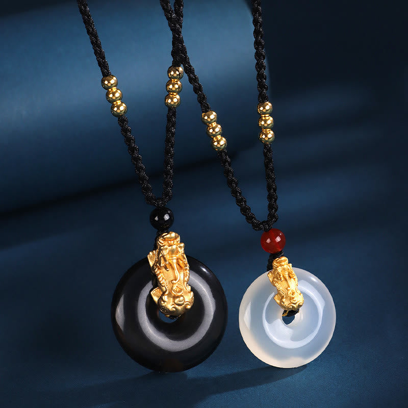 Schwarzonyx und Jade Kette mit goldenem Pixiu Anhänger Wohlstand