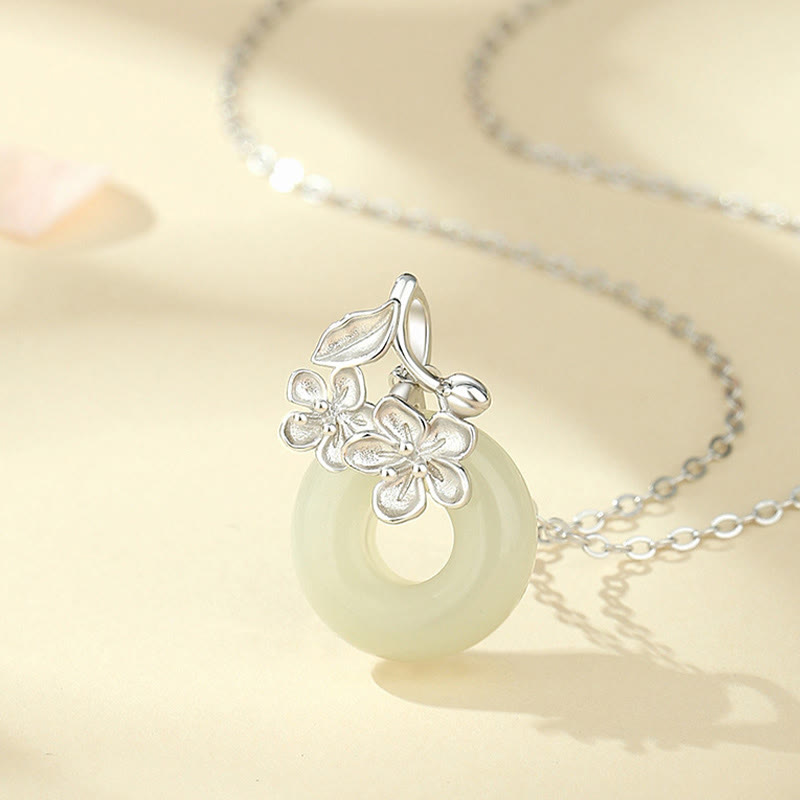 Hetian Jade Kette Sterlingsilber grüner Anhänger Blütenverzierung Naturstein