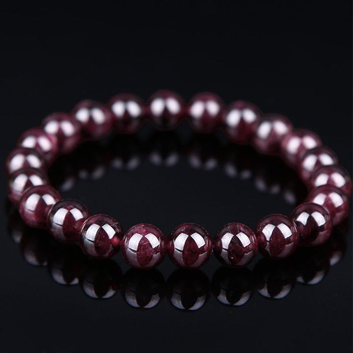 Armband Granat Perlen Leidenschaft Energie rote glänzende Kugeln elastisch