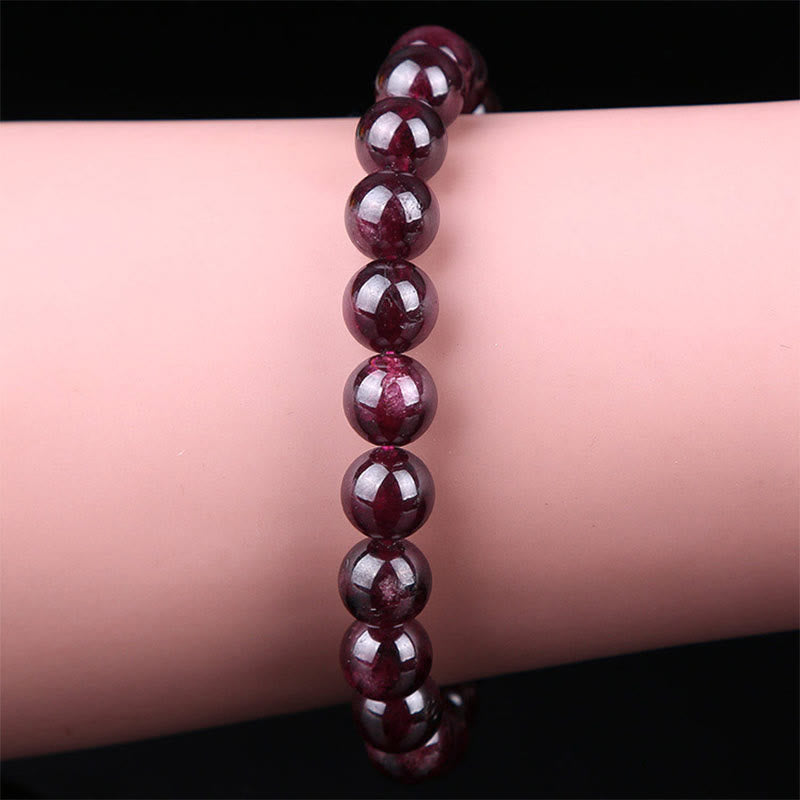 Armband Granat Perlen Leidenschaft Energie rotes Naturstein elastisch Handgelenk getragen