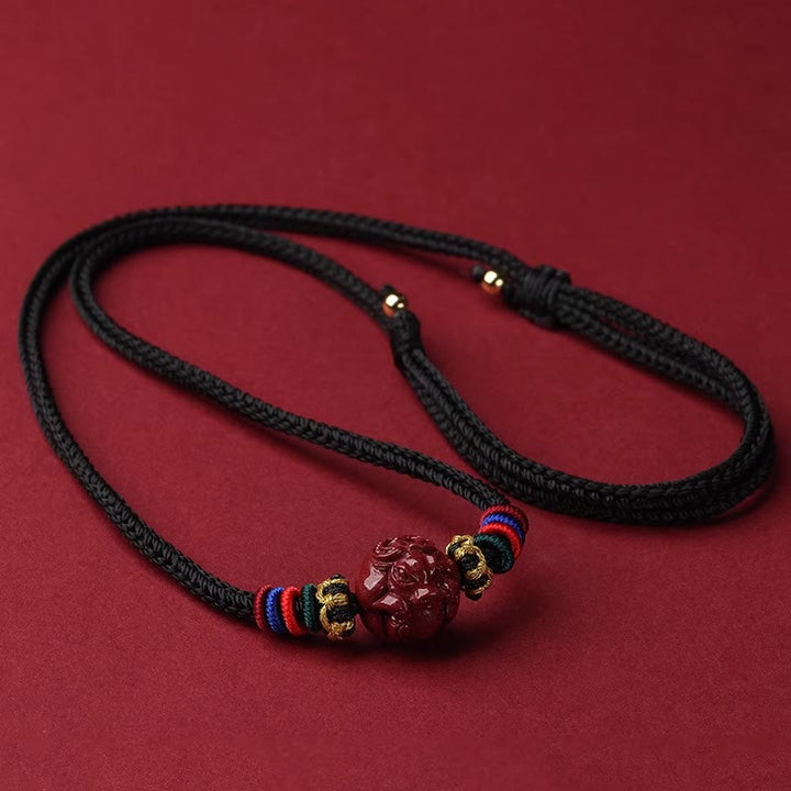 Zinnober Kette schwarzer Nylon Cord farbige Streifen Chinesischer Tierkreis Segen