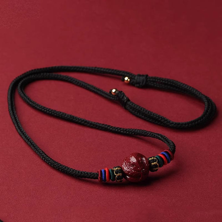Kette Zinnober Chinesischer Tierkreis – Segen mit rotem Anhänger schwarze Schnur