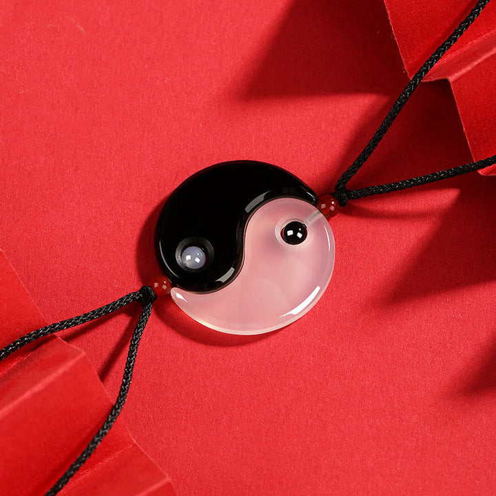 Yin Yang Anhänger schwarzer Onyx rosa Achat Edelsteinkette