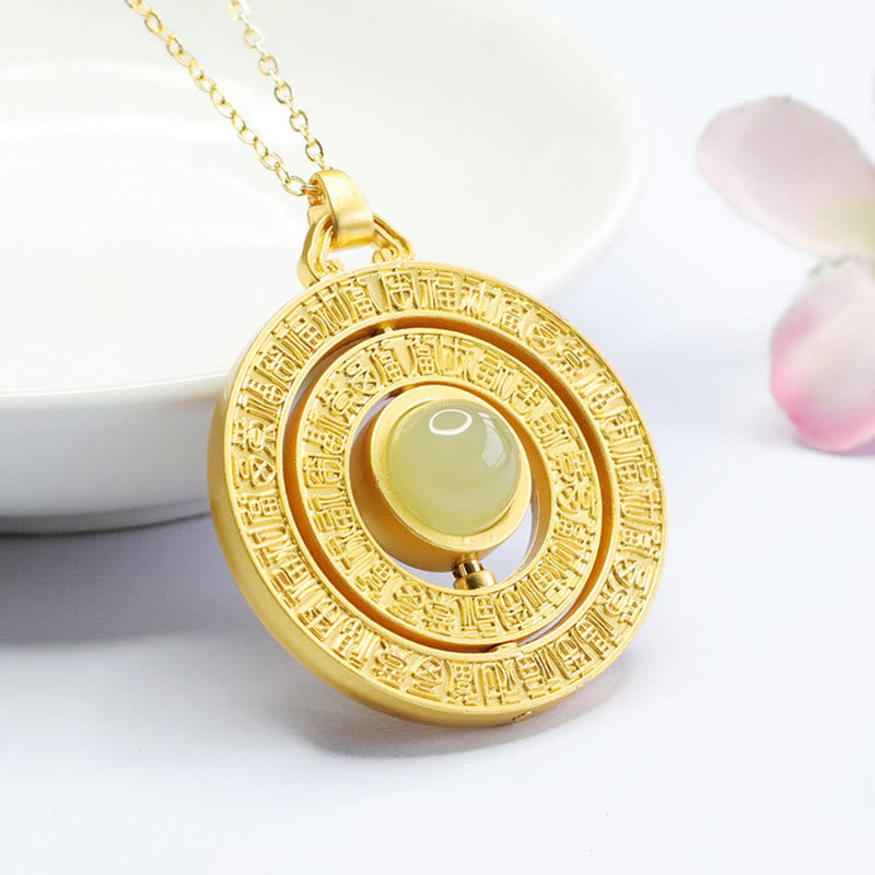 Goldener Anhänger Hetian Jade Fu-Zeichen Drehbar in rundem Gehäuse