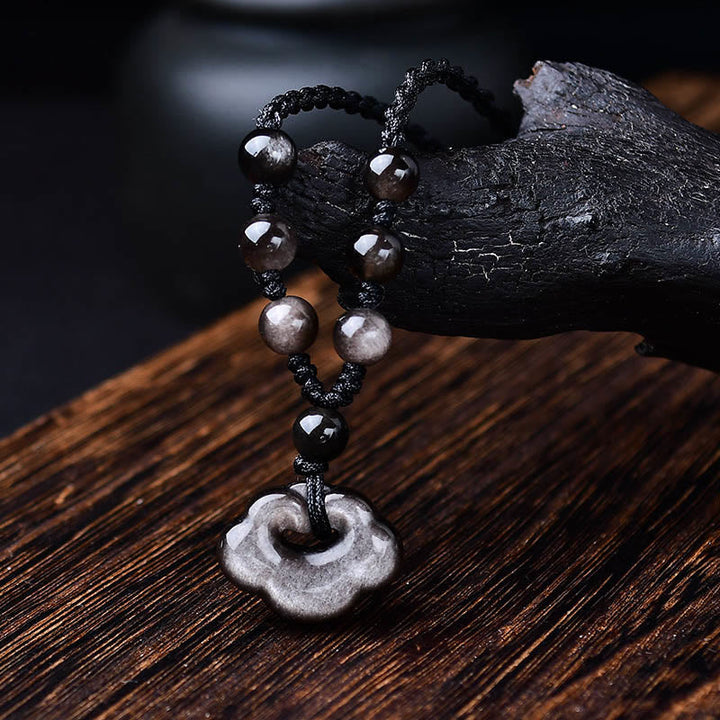 Obsidian Kette am Holzast schwarzer Naturstein Anhänger Schutz