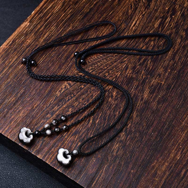 Schwarze Kette Obsidian mit weißen Glückswolken Anhänger Naturstein