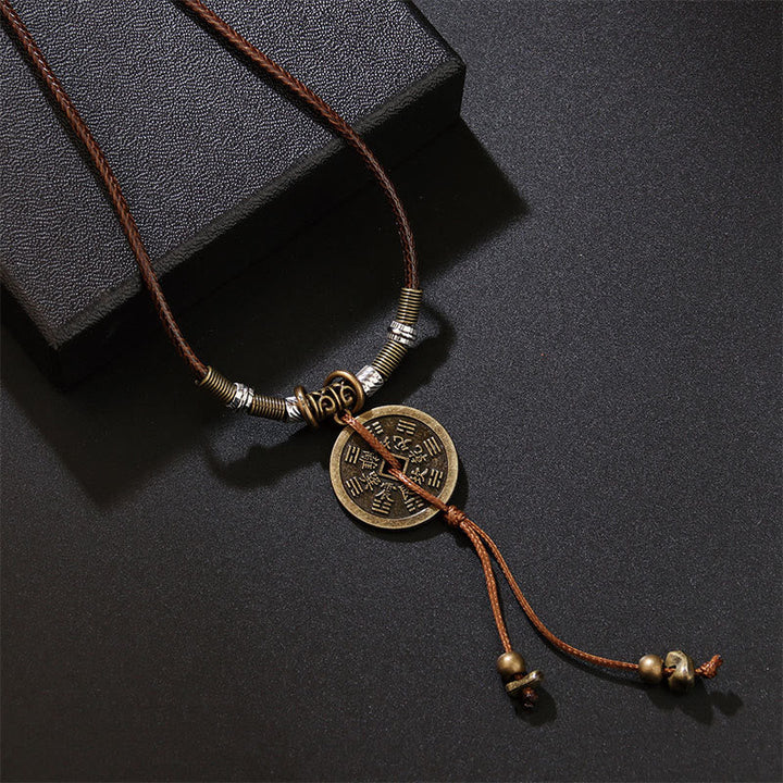 Kette Kupfermünze Bagua – Harmonie goldene Münze braunes Lederband