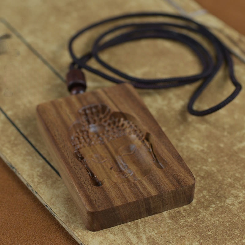 Sandelholz Kette mit Buddha-Symbol Holzanhänger schwarze Schnur