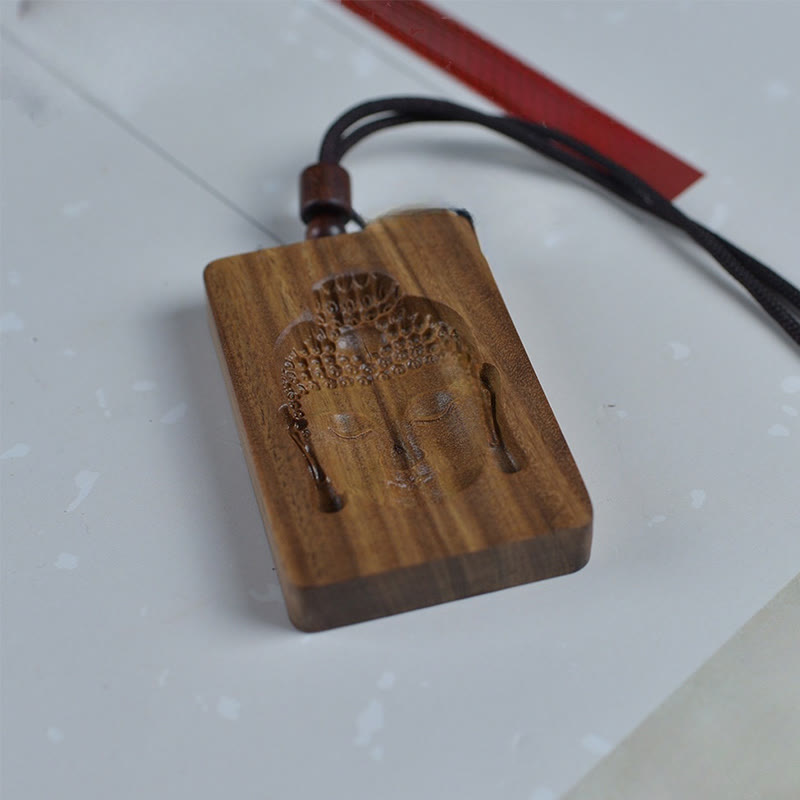 Kette aus Sandelholz mit Buddha-Symbol Anhänger zum Tragen