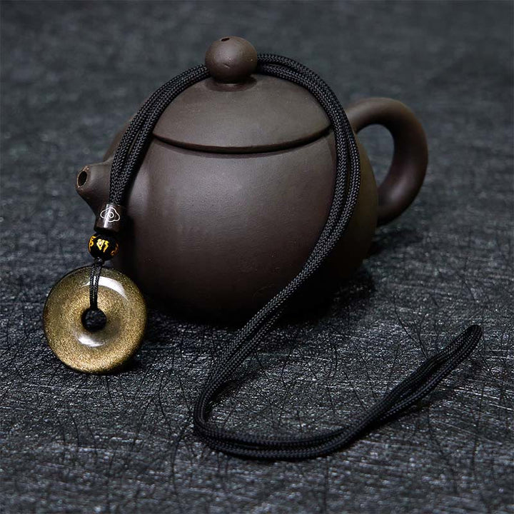 Schwarze Obsidian Kette mit goldener runder Schnalle eleganter Naturstein Anhänger