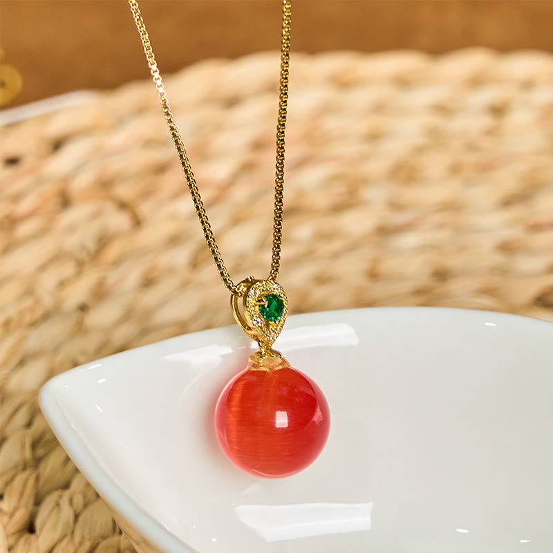 Rote Kette Katzenauge Buddha-Kugel Anhänger goldfarbenes Metall grüner Edelstein