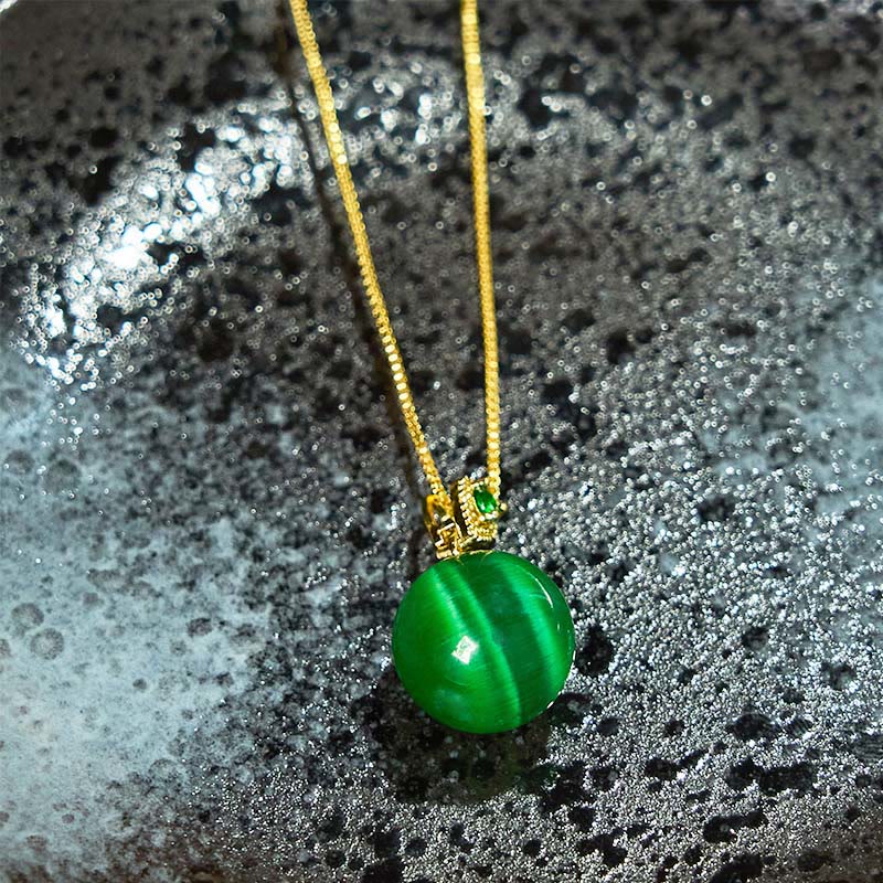 Grüne Katzenauge Buddha-Kugel Anhänger goldene Kette Naturstein