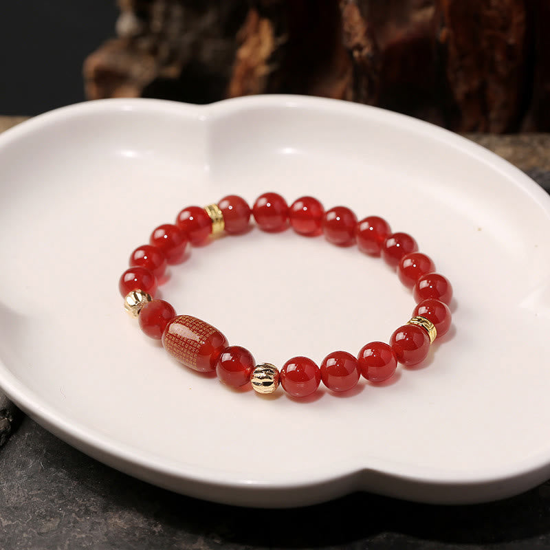Armband Roter Achat mit goldenen Perlen Naturstein elastisch
