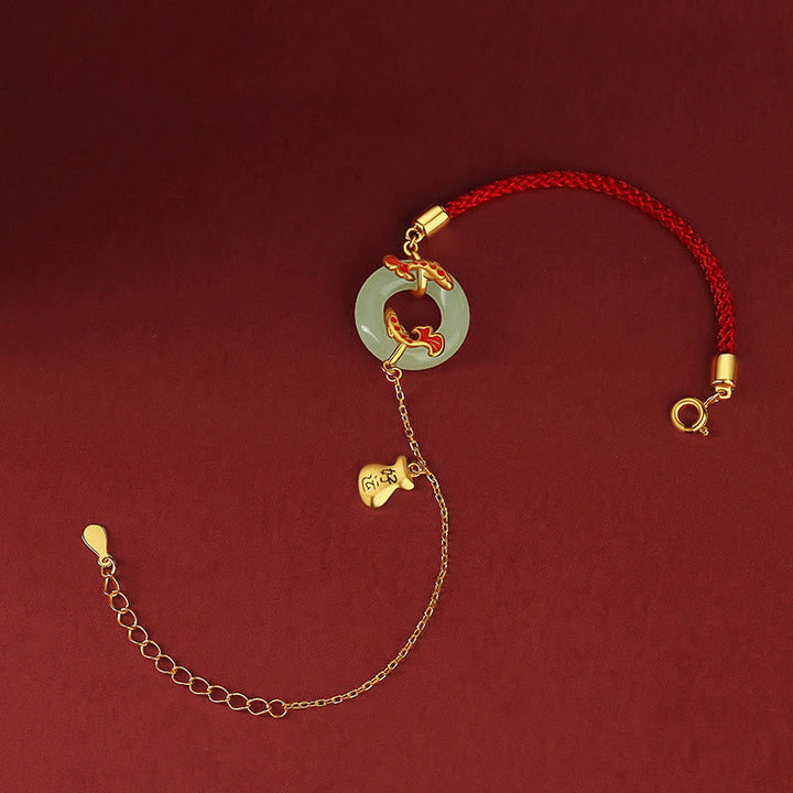 Armband 925 Silber weiße Jade Koi Fisch rotes Seil golden glänzend.