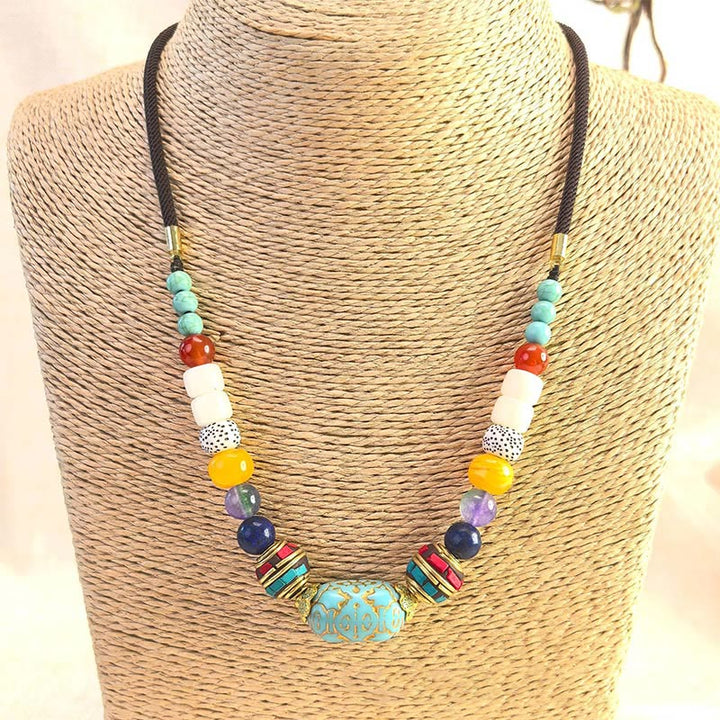 Handgefertigte Chakra Kette mit Türkis Buddha-Perlen Balance