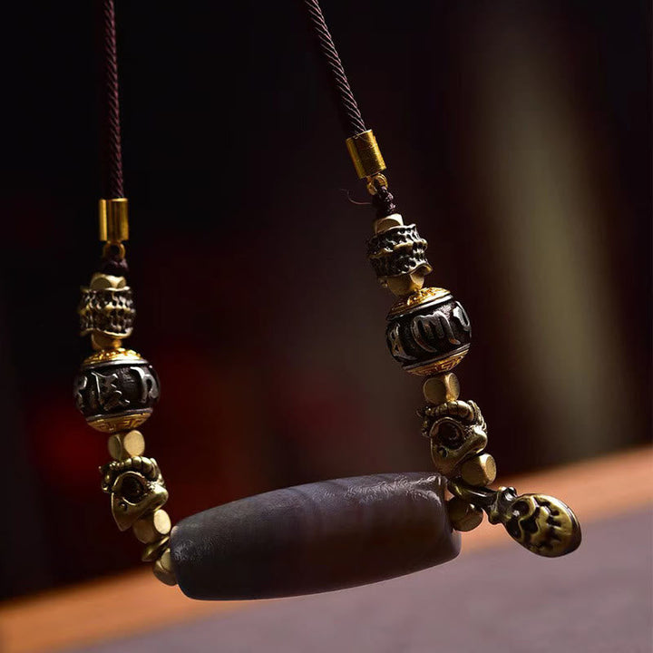 Schwarze Dzi Schutz Kette Tibet goldene Ornamente Naturstein Anhänger
