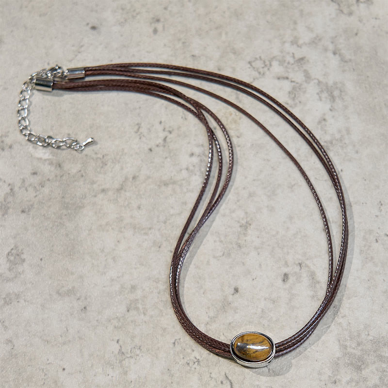 Tigerauge Anhänger Kette Ellipse Schutz Naturstein braun Leder
