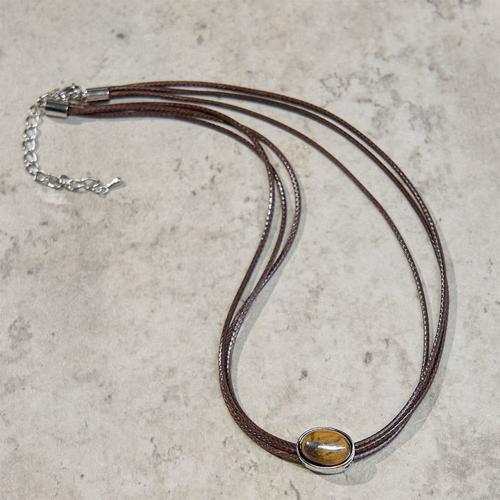 Tigerauge Anhänger Kette Ellipse Schutz Naturstein braun Leder