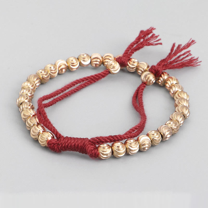 Armband Kupfer – Glück Balance rote Schnur goldene Perlen elastisch.