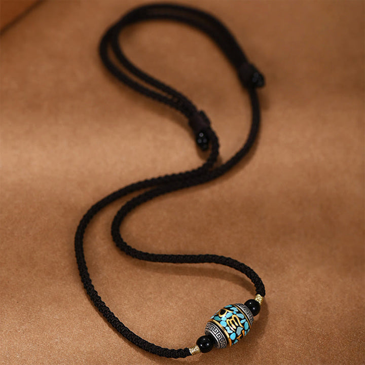 Schwarze Kette mit Tibet Dzi Anhänger Schutzstein Drehbar