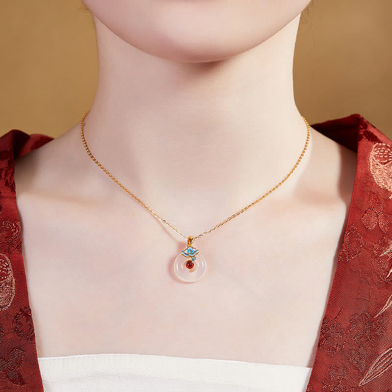 Goldfarbene Kette mit klarem Kristall Anhänger blaue rote Steine Chakra Harmonie
