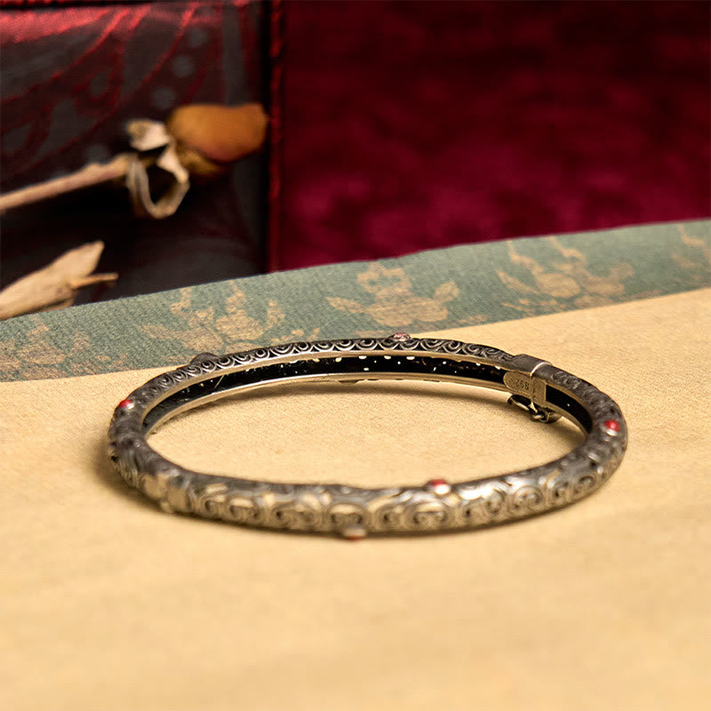 Orniertes Kupfer Armband mit roten Steinen elegantes Design Schmuck