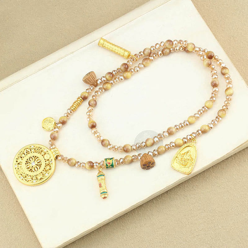 Tigerauge Kette mit Lotus Anhänger Rundplatte Tibet goldene Perlen