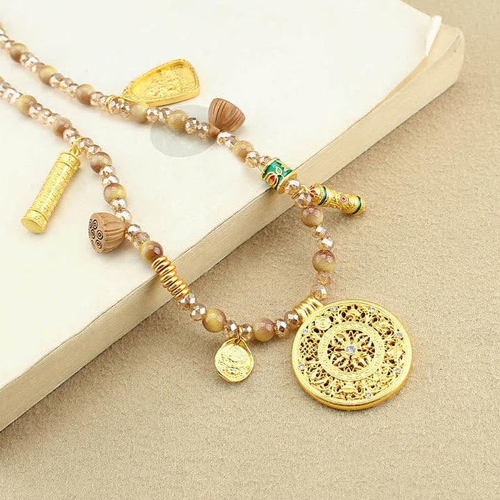 Kette Tigerauge mit Lotus Rundplatte Tibet vergoldeter Anhänger
