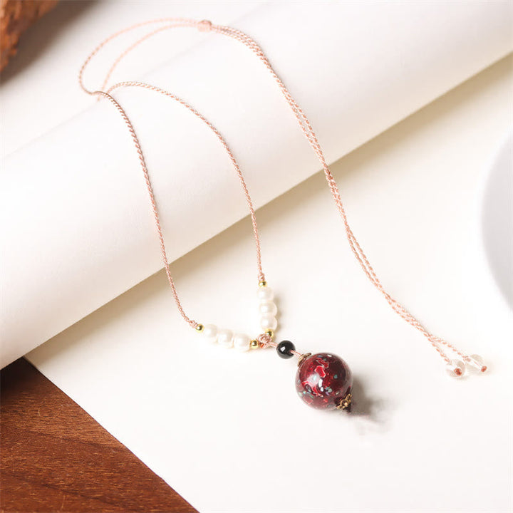 Elegante Kette Rosenquarz Perlen roter Kristall Buddha Anhänger Balance