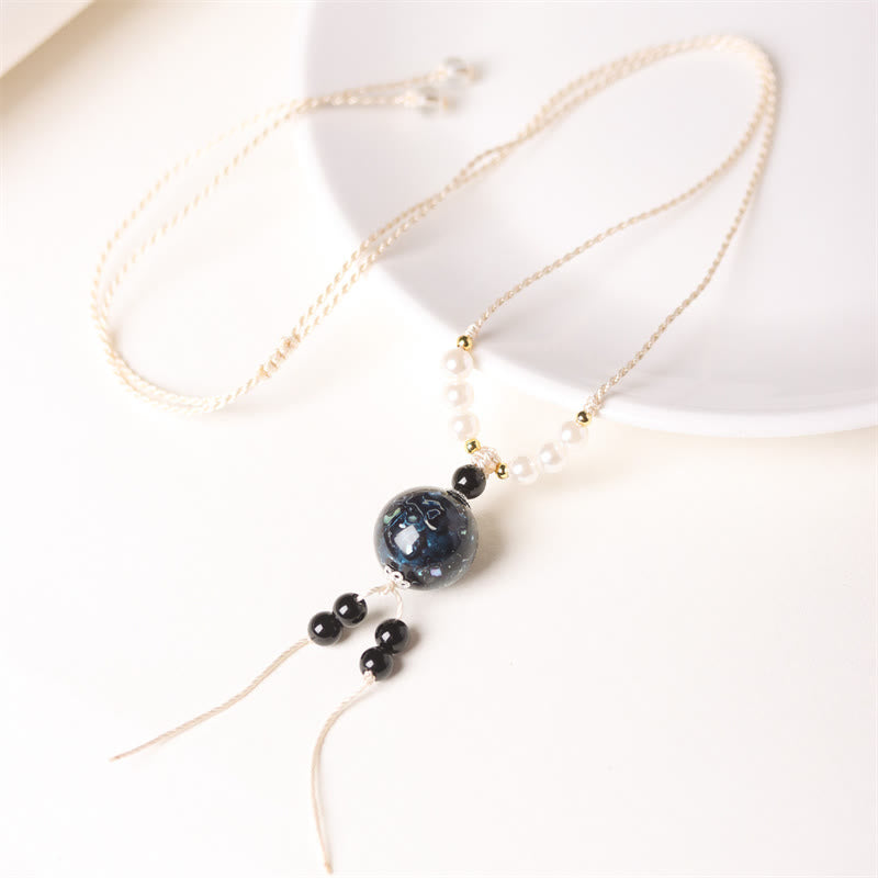 Kette Ebenholz Perlmutt Buddha schwarze weiße Perlen mit Anhänger elegant