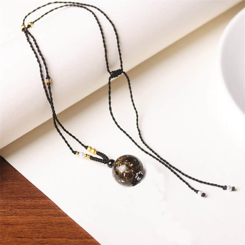 Schwarze Kette Ebenholz Perlmutt Buddha Balance eleganter Anhänger