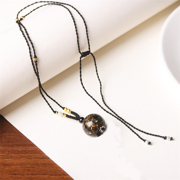 Schwarze Kette Ebenholz Perlmutt Buddha Balance eleganter Anhänger