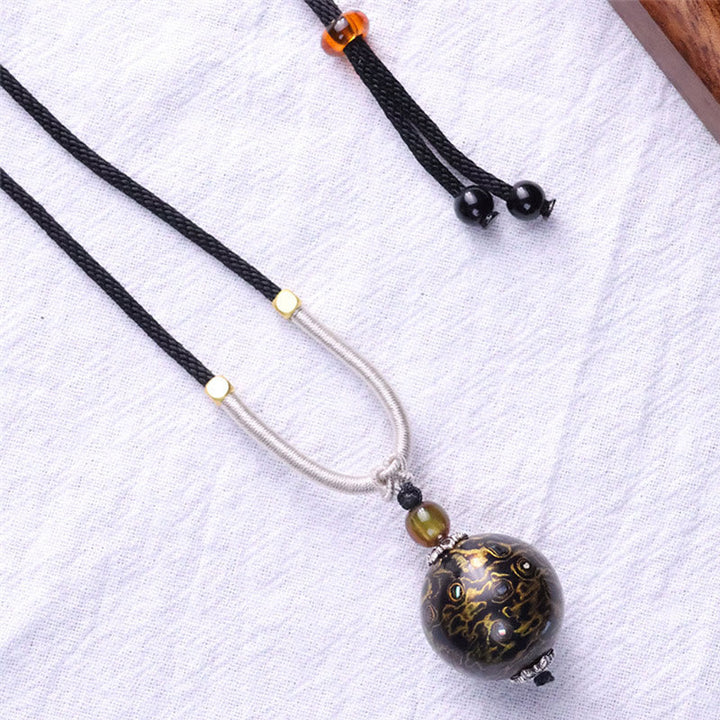 Schwarze Ebenholz Kette mit Buddha Anhänger Naturstein Lack Schmuck
