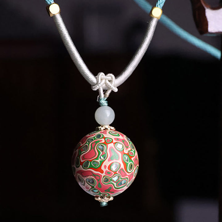 Rote Kette mit lackiertem Buddha Anhänger Naturstein Perle weiss