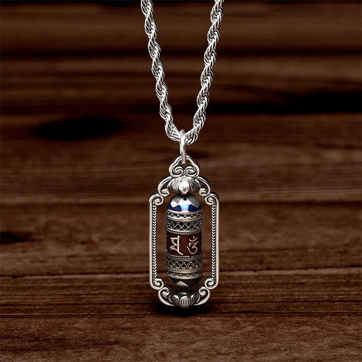 Tibetische Kette mit silbernem Glücksrad Anhänger blauer Stein Vintage Design