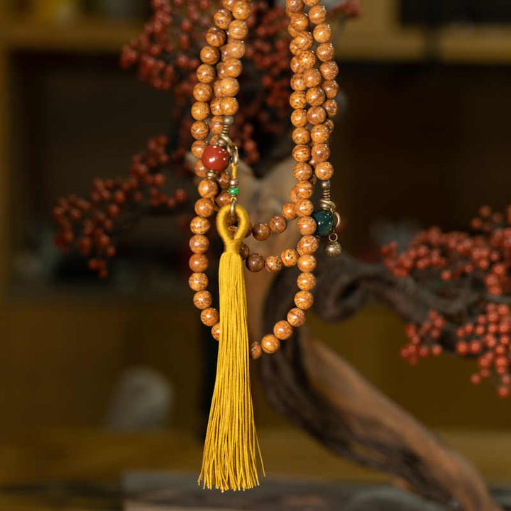 Mala Bodhi Frieden Balance Armband mit braunen Perlen und gelbem Quaste