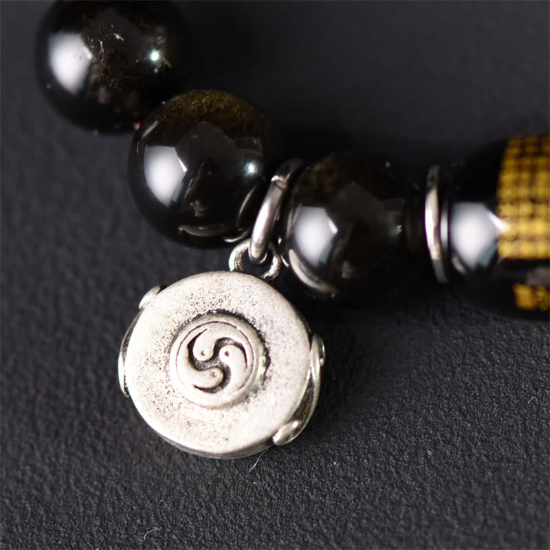 Armband Sandelholz Obsidian mit Spiralanhänger schwarze Perlen
