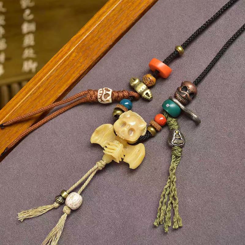 Schädel-Kette Totenwaldherr Tibet Neubeginn Naturstein farbige Anhänger