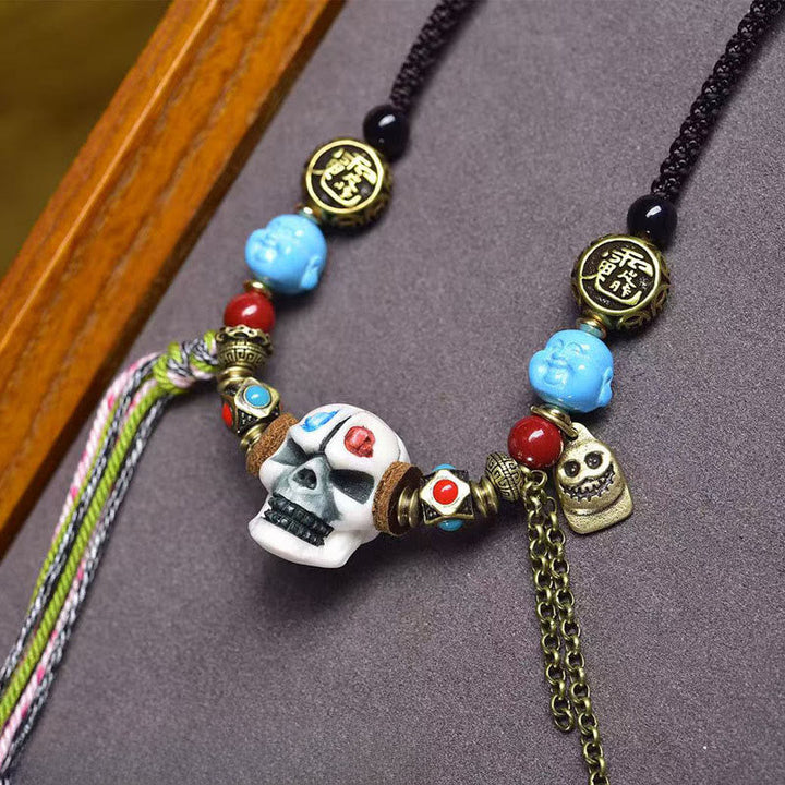 Schwarze Schädel Kette mit Tibet Böse-Geister-Schutz bunte Beads Anhänger