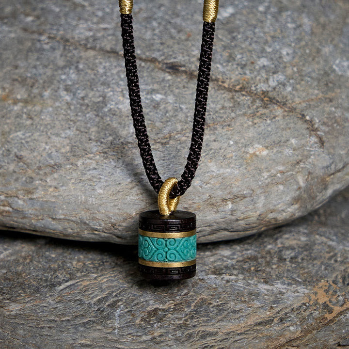 Schwarze Ebenholz Kette mit Türkis Zylinder Anhänger Naturstein