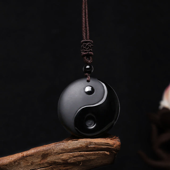 Obsidian Kette Yin Yang Anhänger hängend Naturstein Schutz Balance