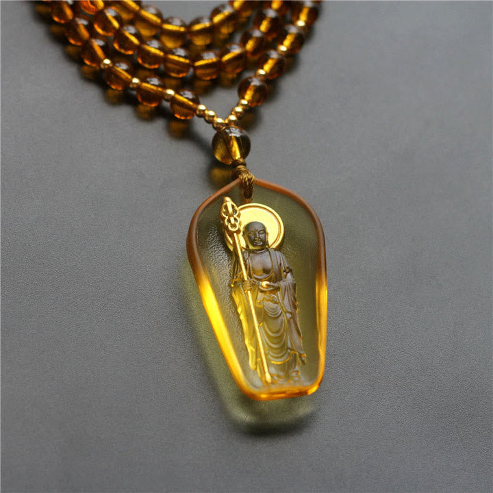 Kette aus Liuli-Kristall mit Ksitigarbha Bodhisattva Anhänger bernsteinfarbig leuchtend