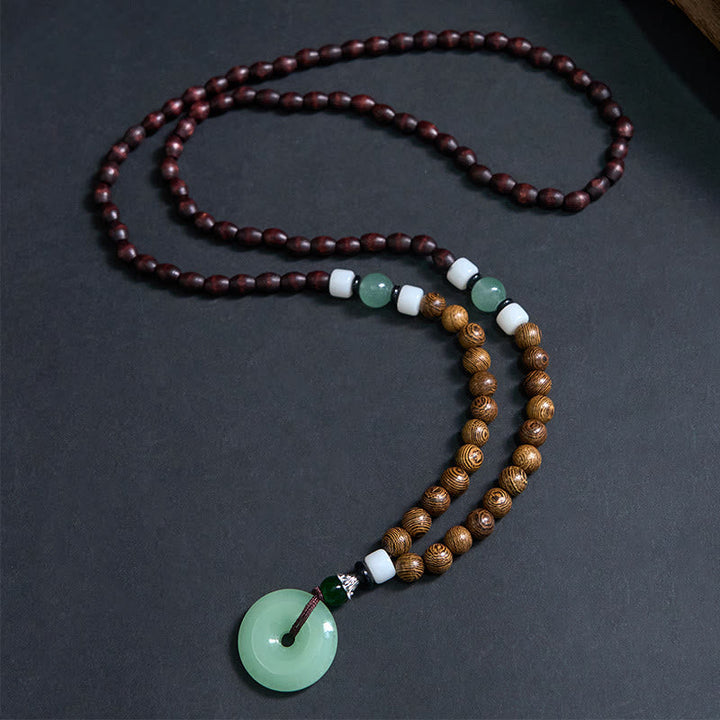 Wenge-Holz Kette mit grünem Jade-Anhänger und Buddha-Schnalle